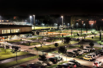 Sport pitches and floodlights at night